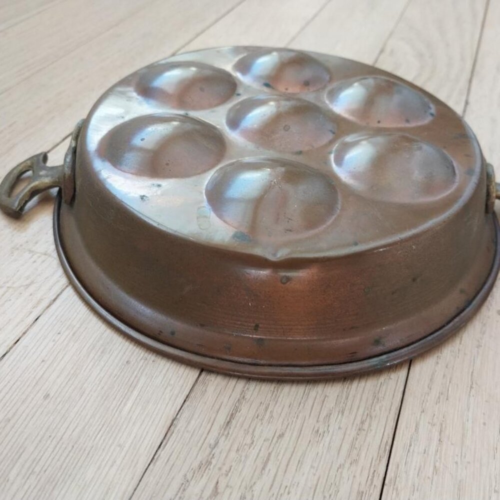 Antique tin-lined copper poacher